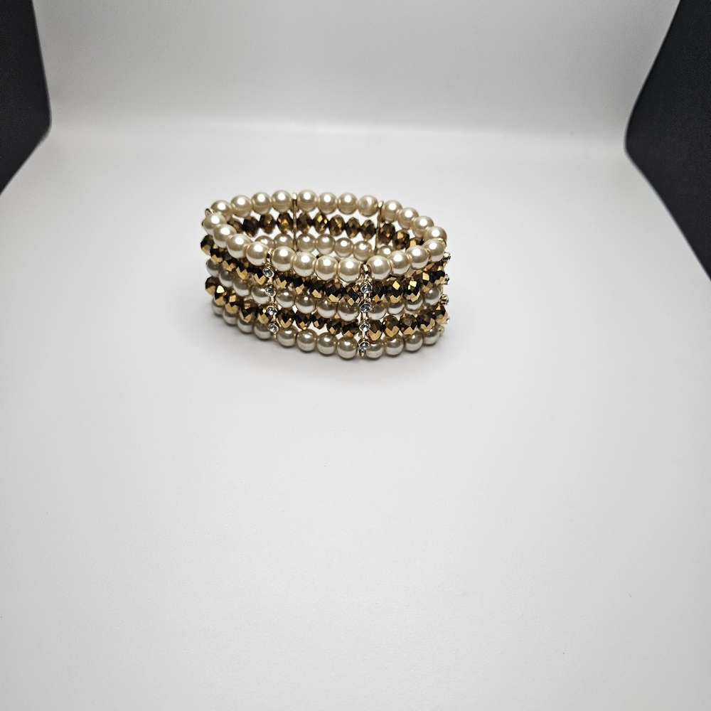 Gold and white bracelet with rhinestones